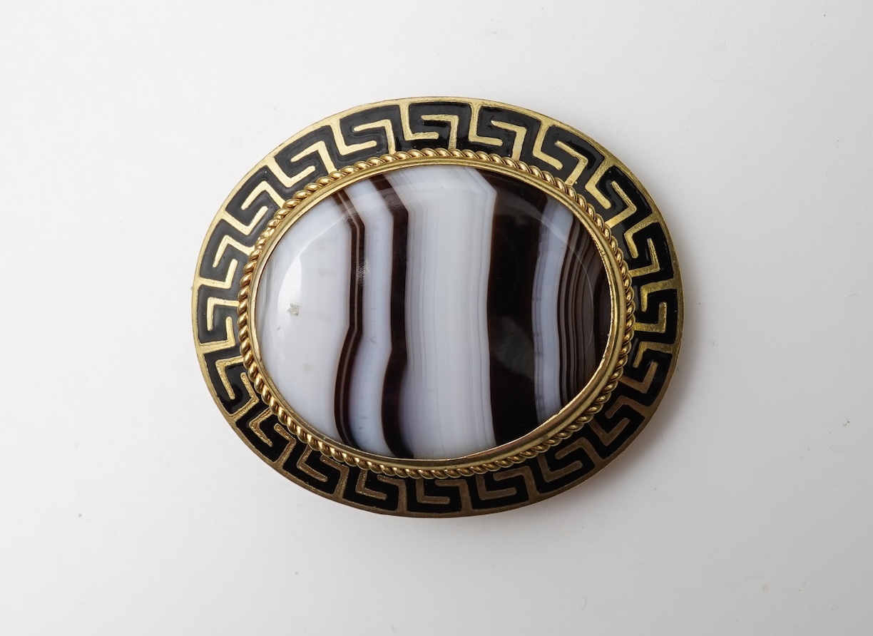 An enamel and onyx demi-parure, late 19th century